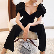 Socialite High Waisted Jumpsuit Puffed Sleeve Asymmetrical Black Size S, M, L, XL